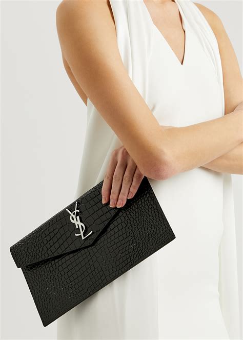 uptown pouch in crocodile-embossed shiny leather